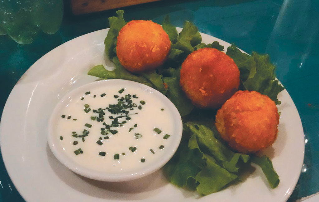 La Boca Del Lobo yucca stuffed with chicken with a cream cheese and white wine sauce
