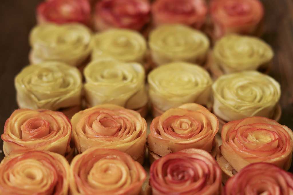 Monique Feybesse of Cavallo Point Lodge fashions three apple varieties into three rose-like tarts