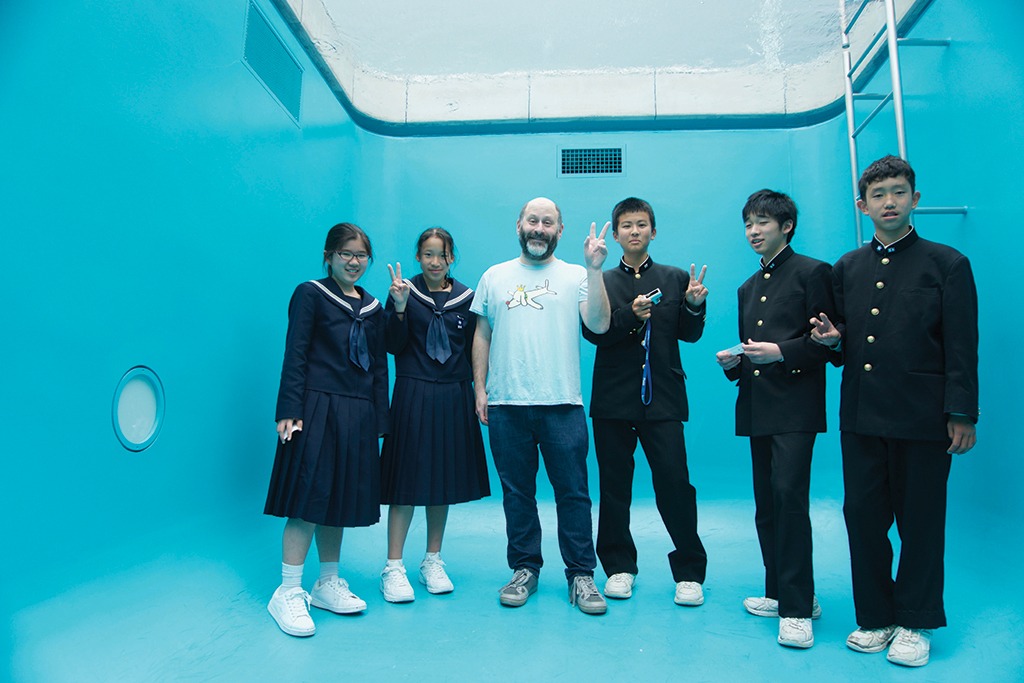 Lawrence and Japanese students in Swimming Pool installation