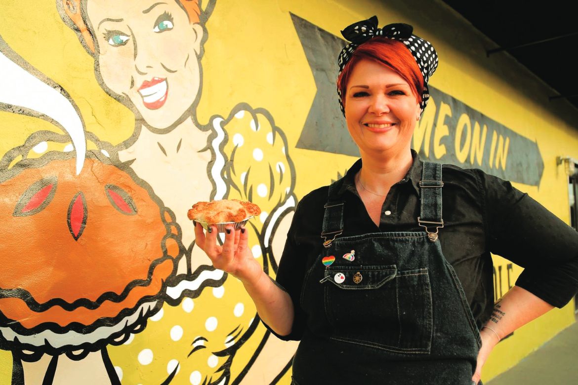 Holding Pie Retoched, Trina Gregory-Propst is one of the Chef Owners (along with her wife VA Propst) of Se7enbites Sweet & Savory Southern Bakeshop