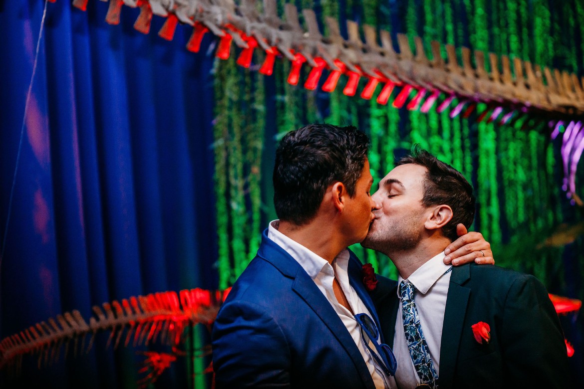 Couple Kissing (Photo By Babywearing Shutterbug Photography)